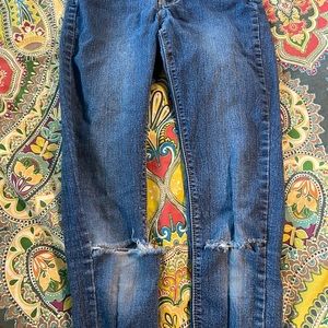 High waisted distressed jeans